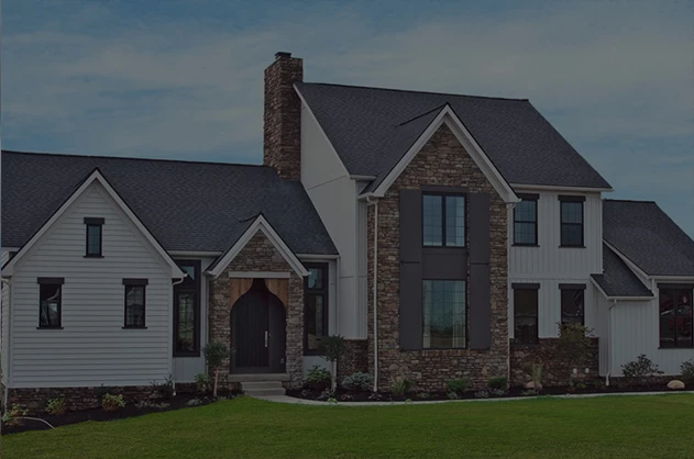 Image of custom home in Ohio with a green lawn