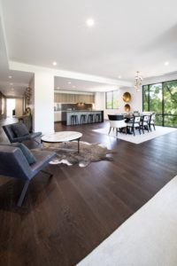 living room with gray sofa and coffee table